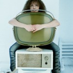 Generic Woman Hugging Vintage TV Set